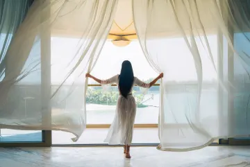 Curtains opening onto the terrace, source photograph