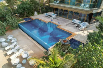 Pool seen from an upper terrace, source photograph